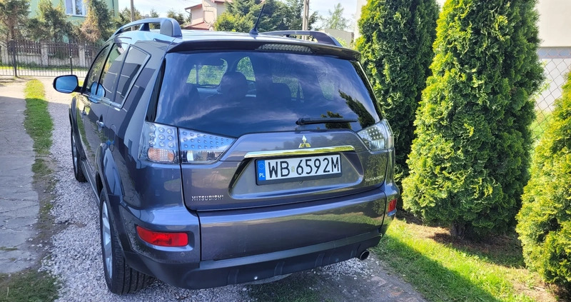 Mitsubishi Outlander cena 38700 przebieg: 234229, rok produkcji 2011 z Żukowo małe 106